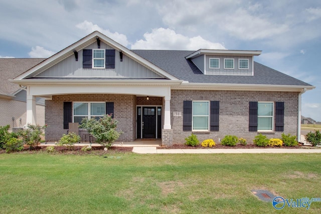 craftsman-style home with a front lawn