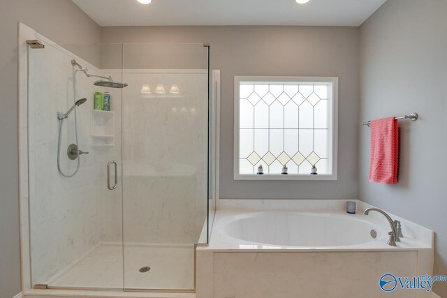 bathroom with independent shower and bath