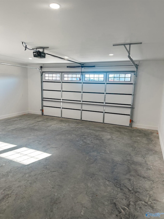 garage featuring a garage door opener