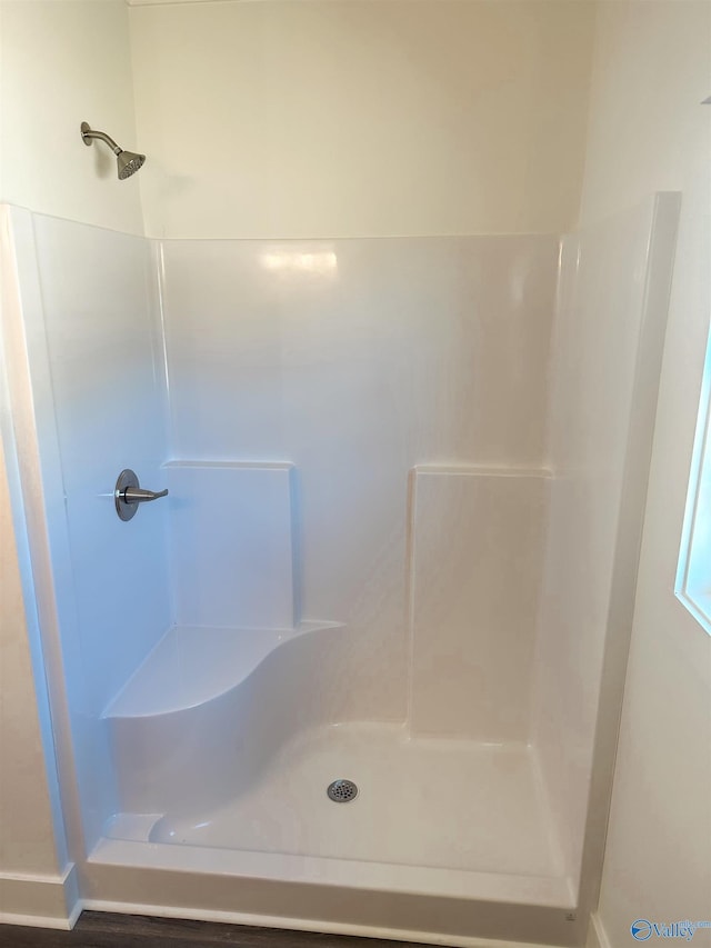 bathroom featuring a shower