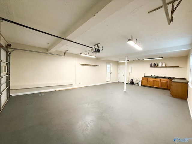 garage featuring a garage door opener