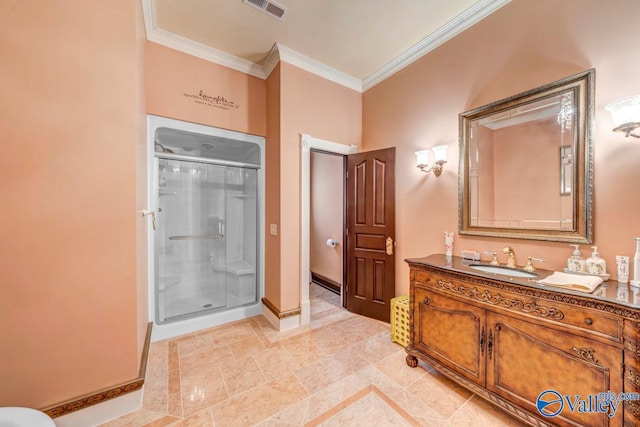 bathroom featuring ornamental molding, vanity, and a shower with shower door