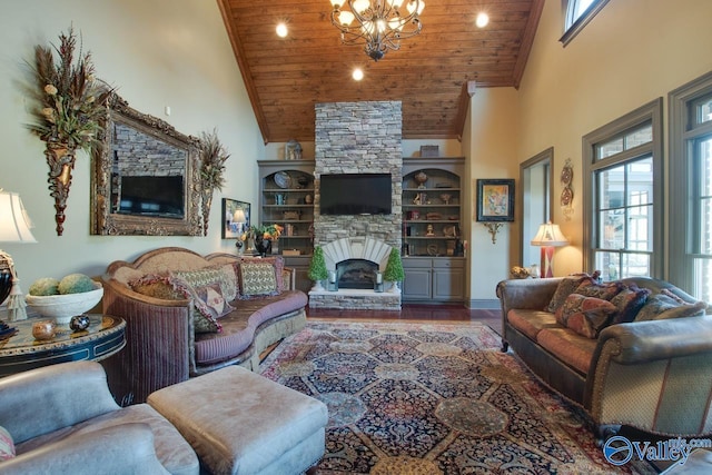 living room with wood ceiling, a chandelier, high vaulted ceiling, a fireplace, and hardwood / wood-style flooring