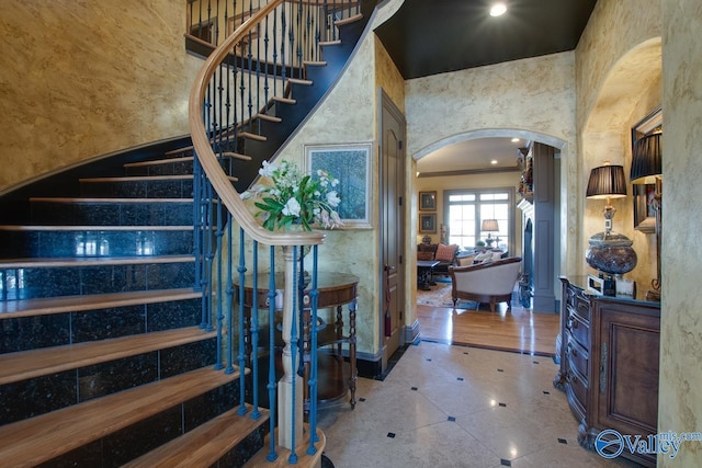 entrance foyer featuring a high ceiling