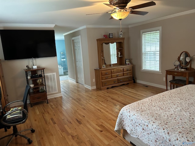 bedroom with ornamental molding, light wood-type flooring, and visible vents