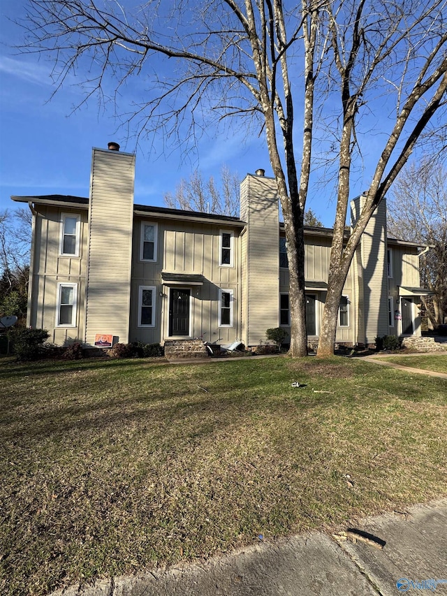 view of front of home with a front lawn