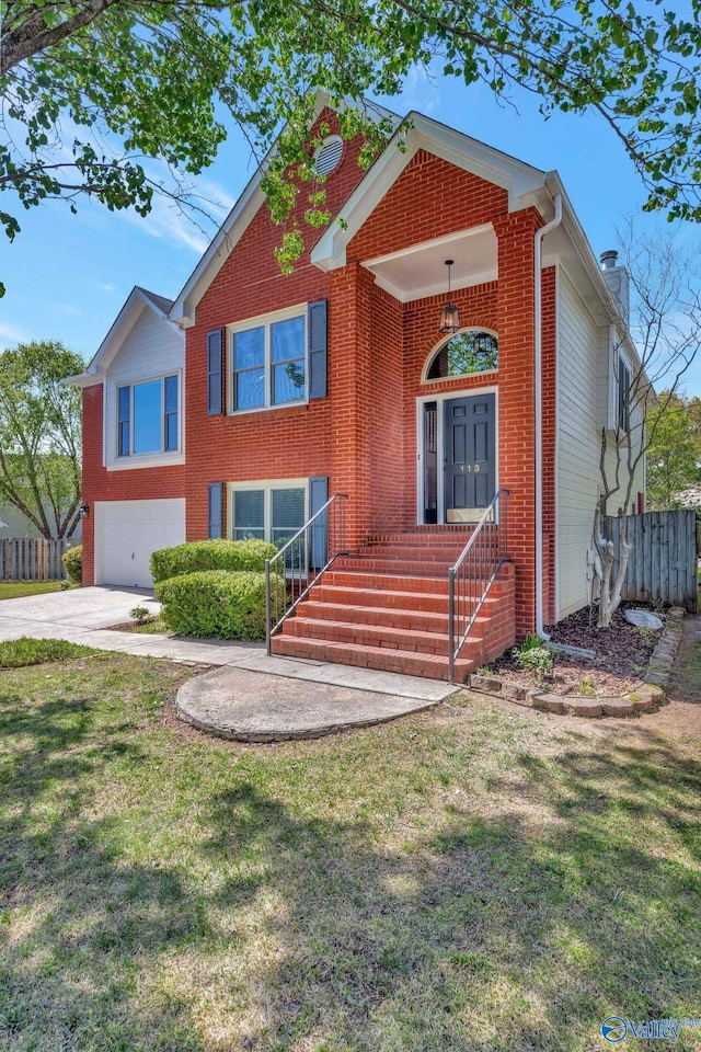 view of front of home featuring an attached garage, fence, brick siding, a front lawn, and driveway