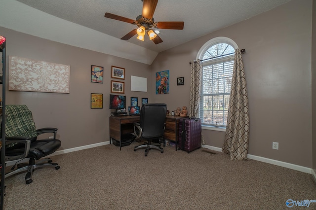 carpeted office featuring a textured ceiling, ceiling fan, and lofted ceiling