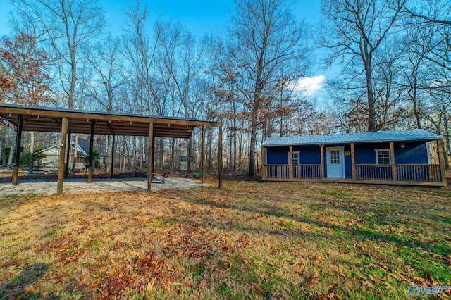 view of yard with a carport