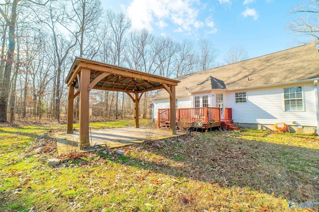 exterior space with a gazebo and a wooden deck