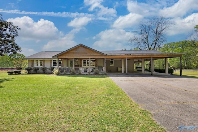 ranch-style house with driveway, a porch, a front lawn, and an attached carport