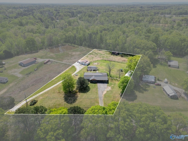 bird's eye view featuring a rural view and a forest view