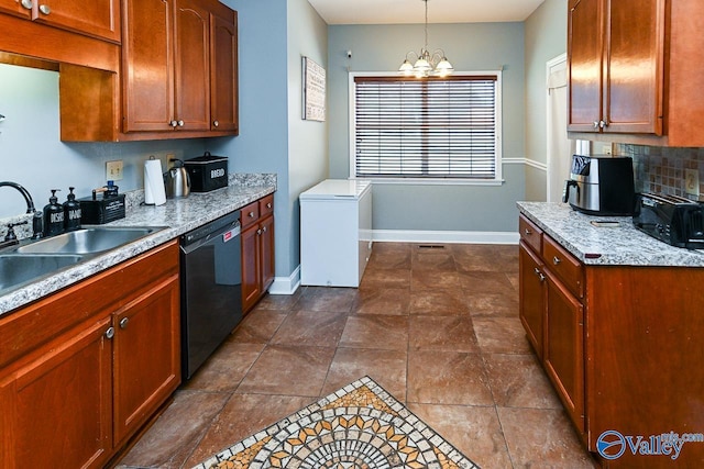 kitchen with dishwasher, hanging light fixtures, backsplash, and baseboards