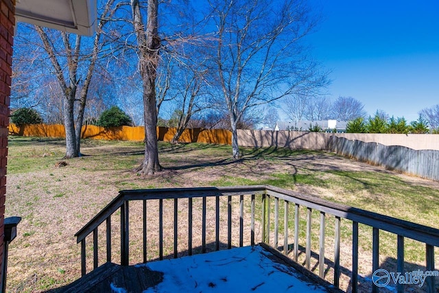 exterior space featuring a lawn and a fenced backyard