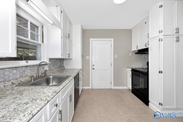 kitchen with black / electric stove, a sink, white cabinetry, and under cabinet range hood