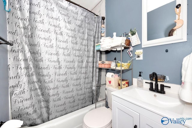 full bath with toilet, shower / bath combo with shower curtain, and vanity