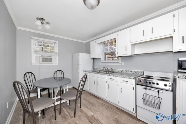 kitchen with ornamental molding, white appliances, a sink, and white cabinetry