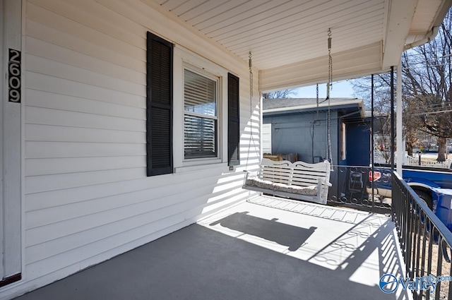 view of patio featuring a porch