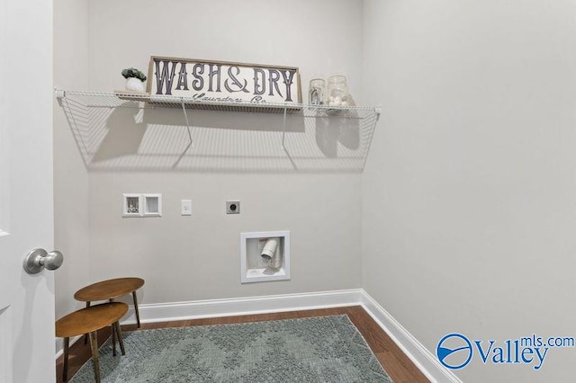 laundry area with hookup for an electric dryer, baseboards, dark wood-type flooring, laundry area, and hookup for a washing machine