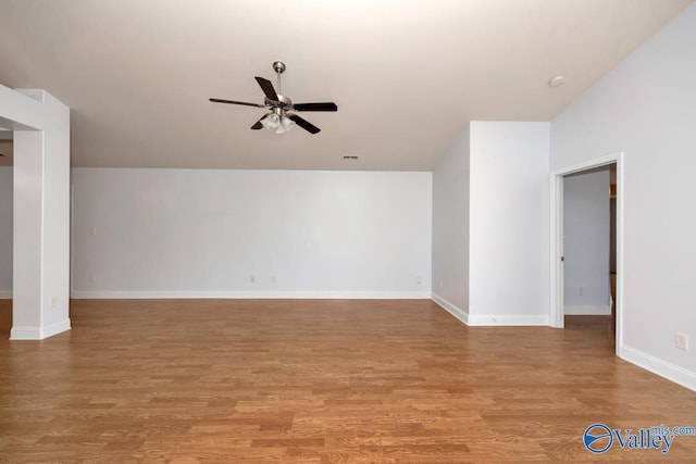 unfurnished room with light hardwood / wood-style floors and ceiling fan