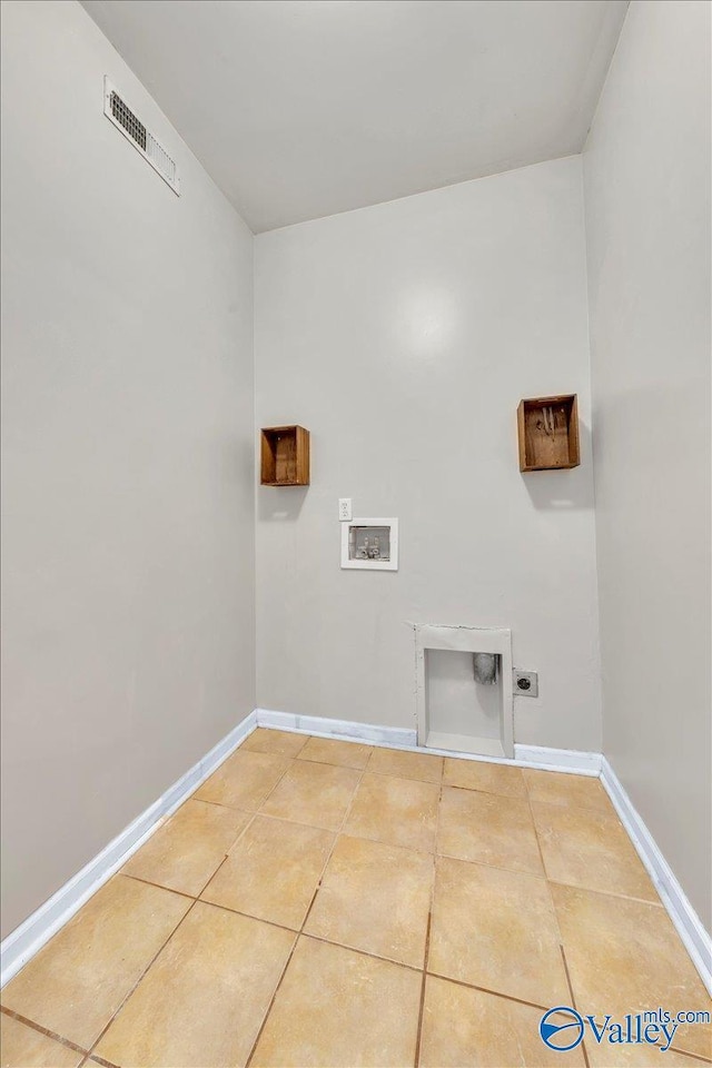 washroom featuring laundry area, baseboards, visible vents, washer hookup, and electric dryer hookup