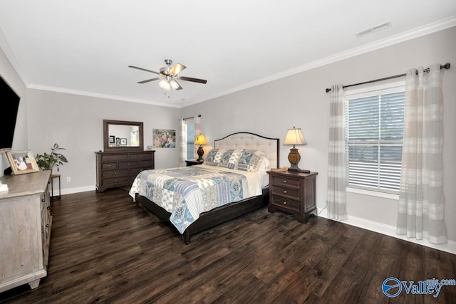 bedroom featuring dark wood-style floors, baseboards, visible vents, and ornamental molding