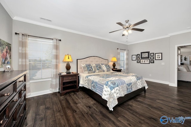 bedroom with multiple windows, dark wood-style flooring, and crown molding