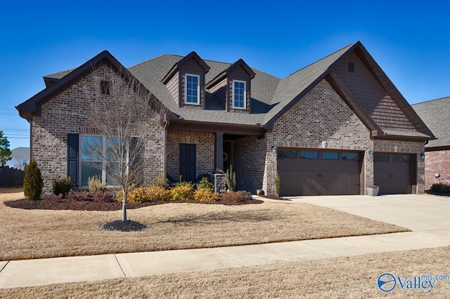 view of front of property featuring an attached garage, driveway, roof with shingles, and brick siding