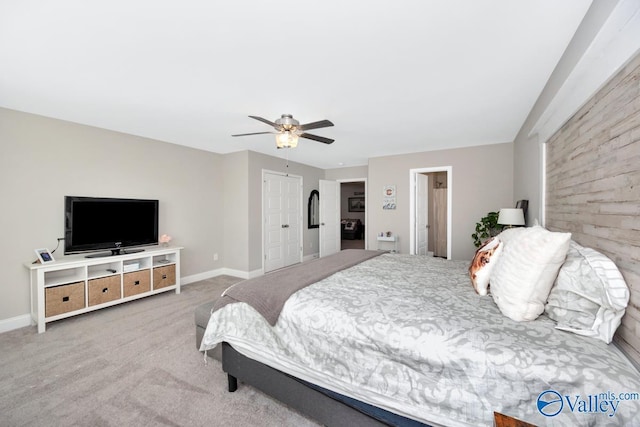 bedroom featuring ceiling fan, carpet floors, and baseboards