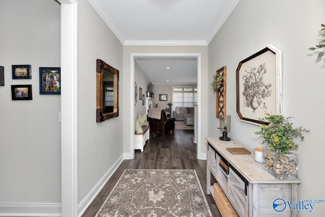 hall with baseboards, dark wood-type flooring, and crown molding