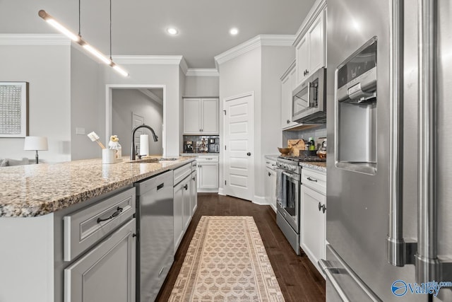 3015 Peevey Creek Ln, Owens Cross Roads, AL 35763 - kitchen with appliances with stainless steel finishes, a sink, crown molding, backsplash, and white cabinets