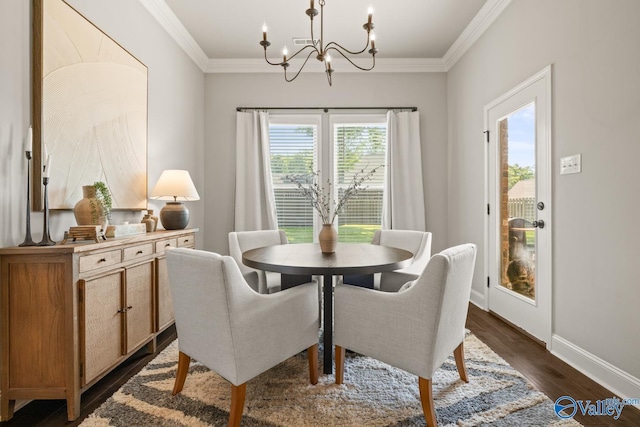 3015 Peevey Creek Ln, Owens Cross Roads, AL 35763 - dining room with a chandelier, ornamental molding, dark wood-style floors, and baseboards