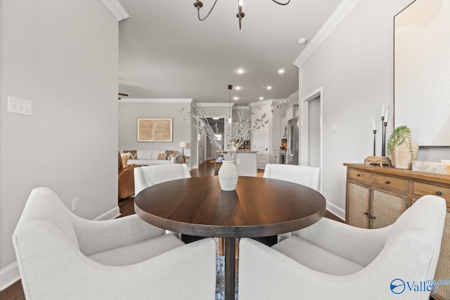 3015 Peevey Creek Ln, Owens Cross Roads, AL 35763 - dining room with a chandelier, crown molding, baseboards, wood finished floors, and recessed lighting