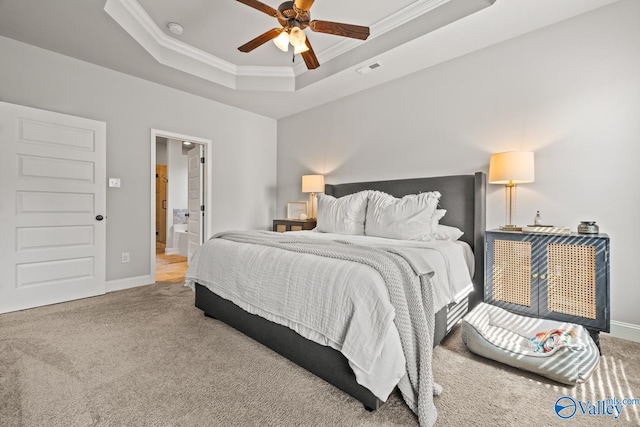 3015 Peevey Creek Ln, Owens Cross Roads, AL 35763 - bedroom featuring crown molding, carpet floors, a tray ceiling, baseboards, and ensuite bathroom