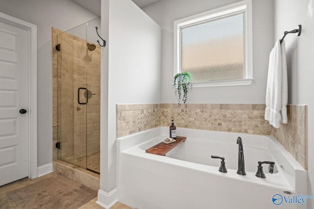 3015 Peevey Creek Ln, Owens Cross Roads, AL 35763 - bathroom with a garden tub, a shower stall, and tile patterned floors