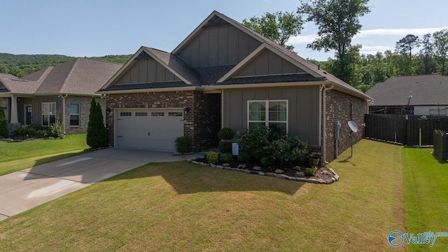 3015 Peevey Creek Ln, Owens Cross Roads, AL 35763 - view of front of property featuring board and batten siding, brick siding, an attached garage, driveway, and roof with shingles