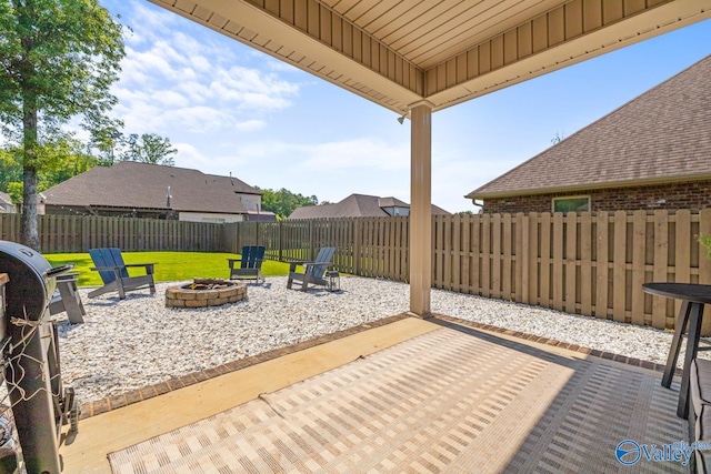 3015 Peevey Creek Ln, Owens Cross Roads, AL 35763 - view of patio / terrace featuring an outdoor fire pit and a grill