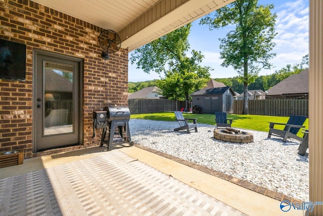 3015 Peevey Creek Ln, Owens Cross Roads, AL 35763 - view of patio featuring a fire pit and area for grilling