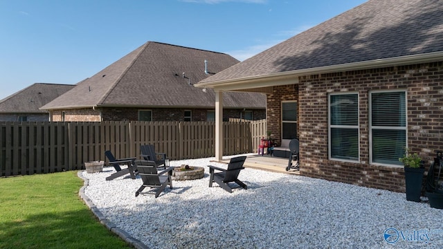 3015 Peevey Creek Ln, Owens Cross Roads, AL 35763 - view of patio with a fire pit