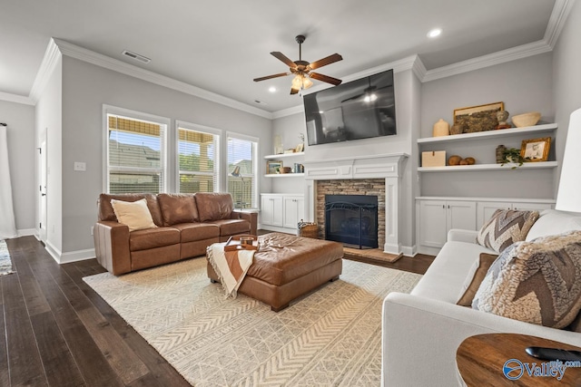 3015 Peevey Creek Ln, Owens Cross Roads, AL 35763 - living room featuring hardwood / wood-style floors, a ceiling fan, ornamental molding, a stone fireplace, and recessed lighting