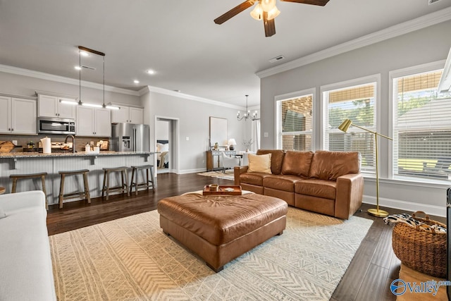 3015 Peevey Creek Ln, Owens Cross Roads, AL 35763 - living room featuring dark wood finished floors, a ceiling fan, baseboards, crown molding, and recessed lighting