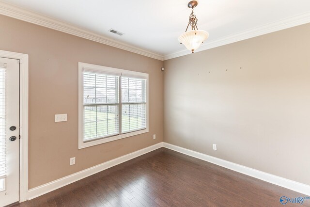 unfurnished room featuring crown molding and dark hardwood / wood-style floors