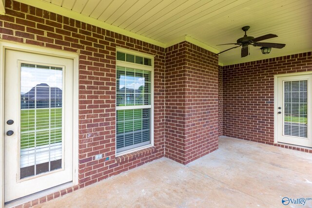 view of patio featuring ceiling fan