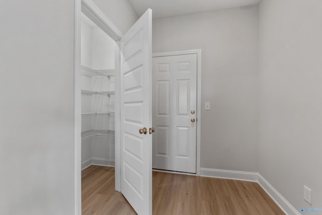 full bathroom featuring hardwood / wood-style flooring, vanity, bathing tub / shower combination, and toilet