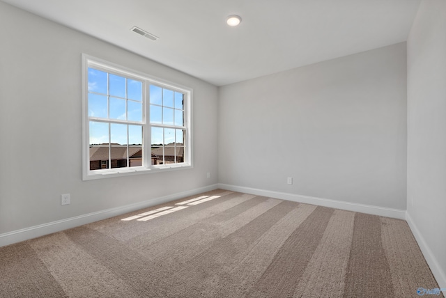 view of carpeted spare room