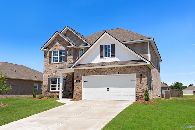 107 Hazel Pine Trl, Hazel Green, AL 35750 - view of front of home with brick siding, driveway, a front lawn, and roof with shingles