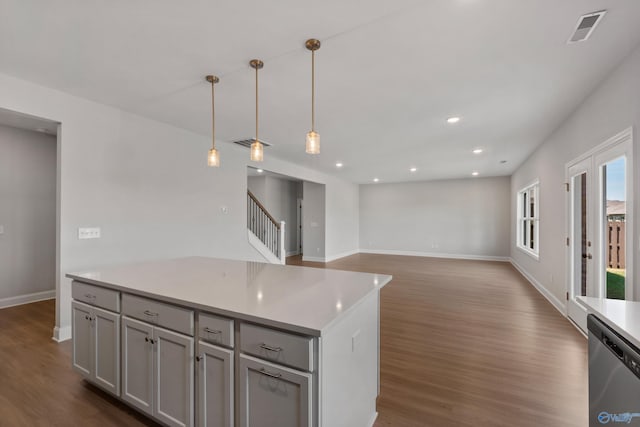 empty room with hardwood / wood-style floors