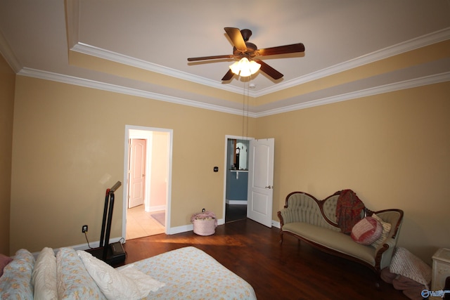 bedroom featuring ceiling fan, dark hardwood / wood-style flooring, and ornamental molding