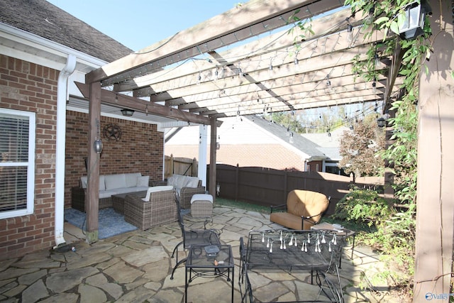 view of patio with an outdoor living space and a pergola