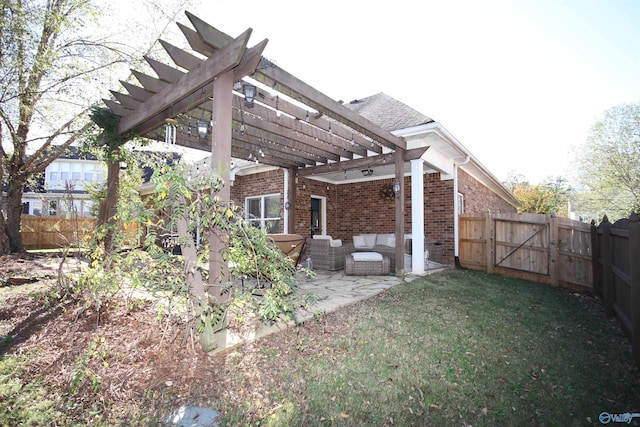 view of yard with outdoor lounge area, a pergola, and a patio